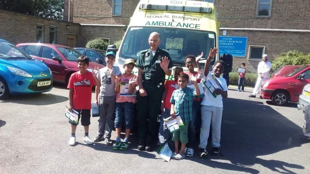Boys with an Ambulance Car on Precious Pearls 2016 Events